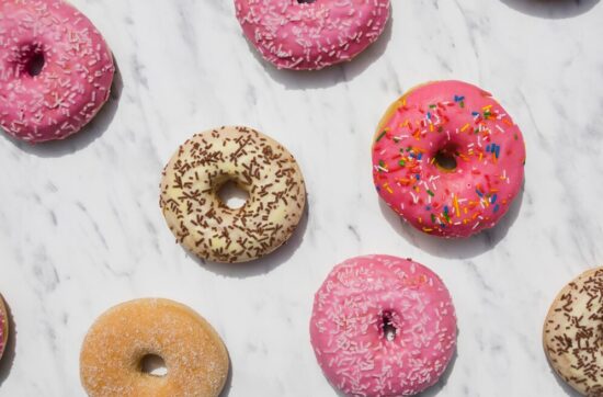 Several doughnuts, a popular type of sweet fried dough