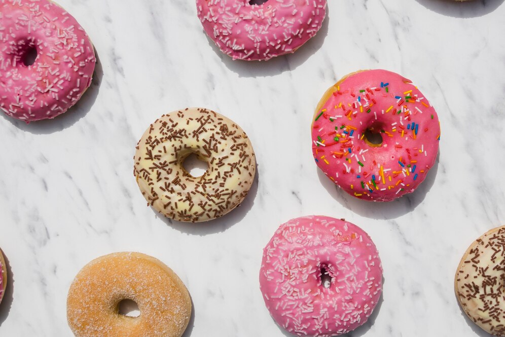 Several doughnuts, a popular type of sweet fried dough